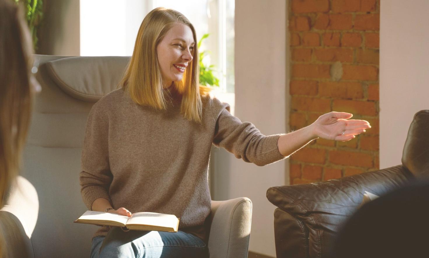 Calculator and financial analysis tools on desk with budget reports